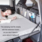 Car camping bed extension board with quilted cover and storage organizers, person lying
