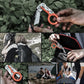 Foldable multifunctional scissors with orange handle and black frame, silver blades