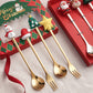 4-piece Christmas doll spoon and fork set, gold-toned utensils with character heads
