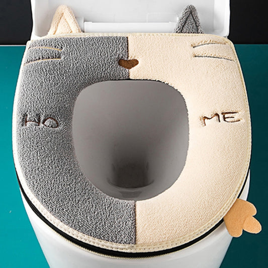 Two-tone toilet seat cover with cat ears, paw accents, and oval bowl opening