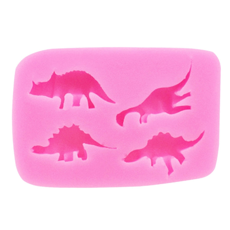 Pink dinosaur silicone mold with four dinosaur silhouettes