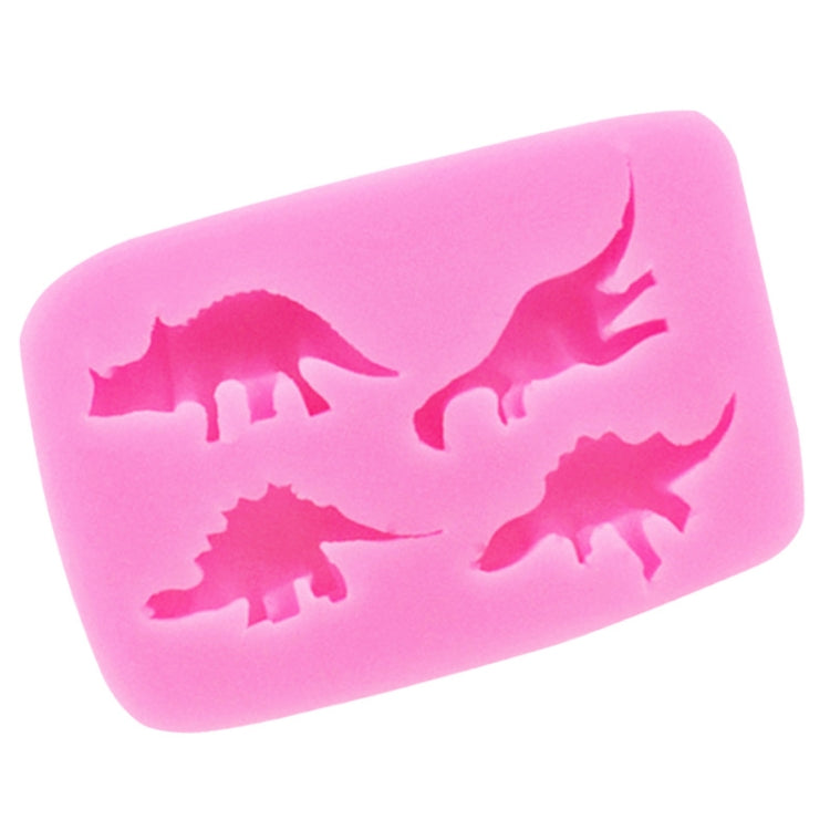 Pink dinosaur silicone mold with three dinosaur silhouettes