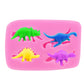 Pink dinosaur silicone mold with dinosaur shapes in green, yellow, blue, and purple