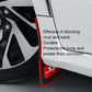 Installed black mud flap with red trim and triangular Sports graphic near wheel