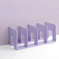 Purple acrylic desktop book storage rack with five bookends and open book slots
