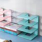 Teal acrylic desktop book storage rack with layered open slots for books