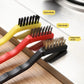 Detail view of kitchen cleaning brushes with nylon, wire, and copper wire bristles.