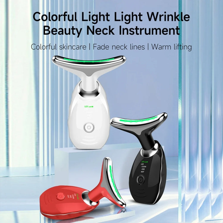 White and black oval LED neck massagers with green light display.