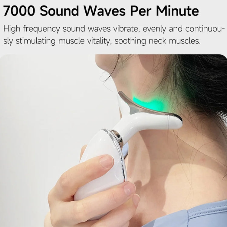 Oval neck beauty instrument with green light strip near user’s shoulder and neck