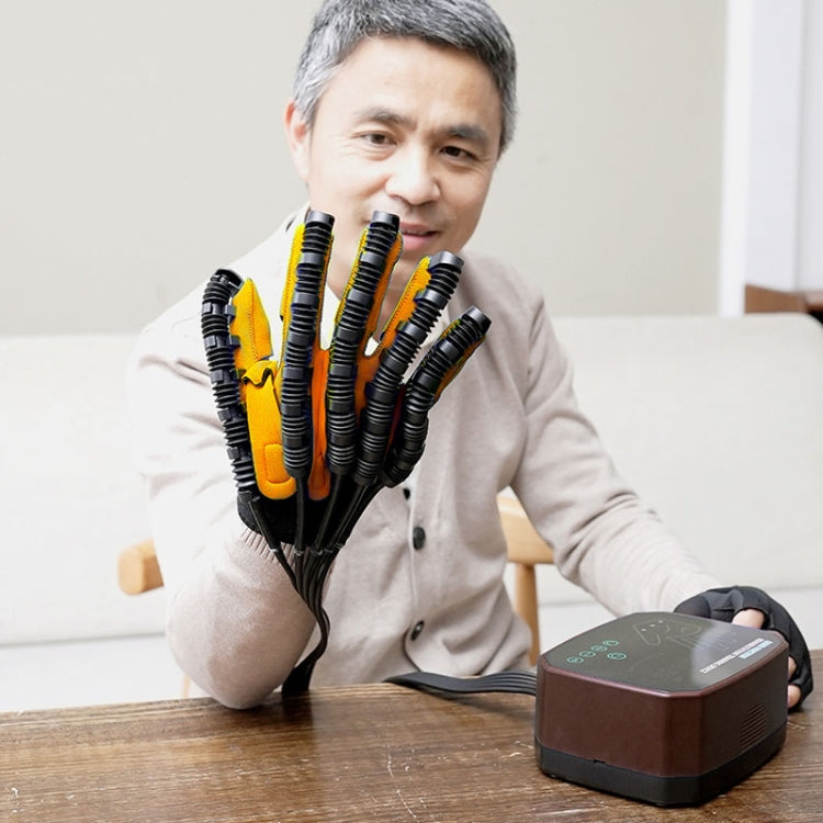 Robotic rehabilitation glove device with black finger sleeves and yellow inserts plus controller