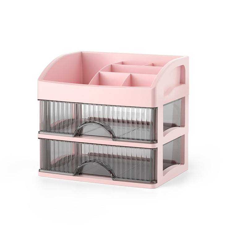 Pink multi-layer drawer organizer with clear compartments and arched dividers