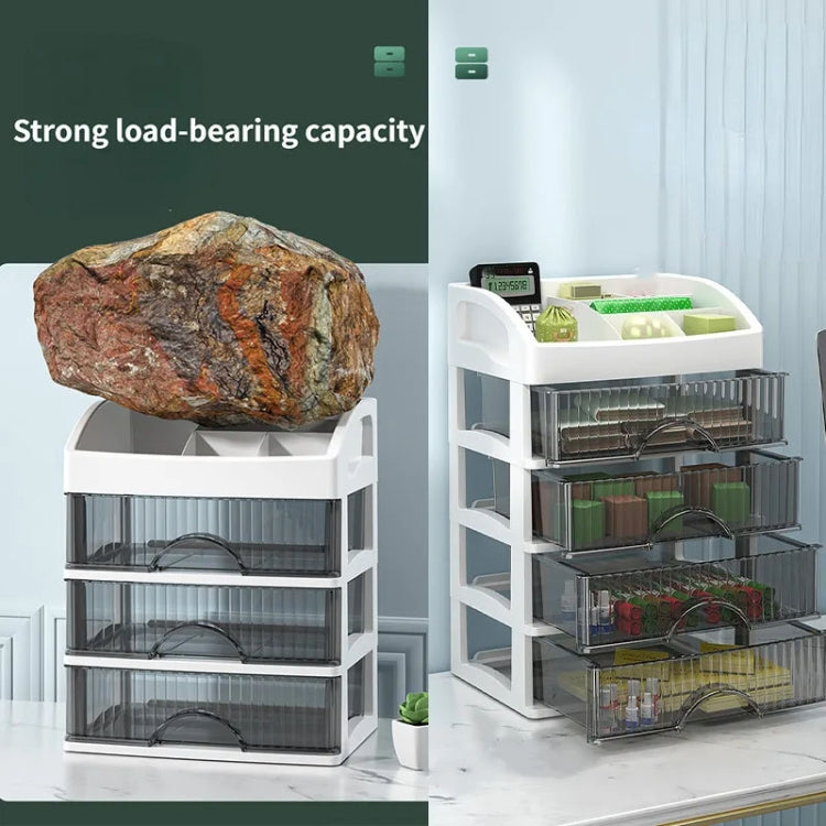 White multi-layer drawer organizer with transparent drawers supporting a heavy stone