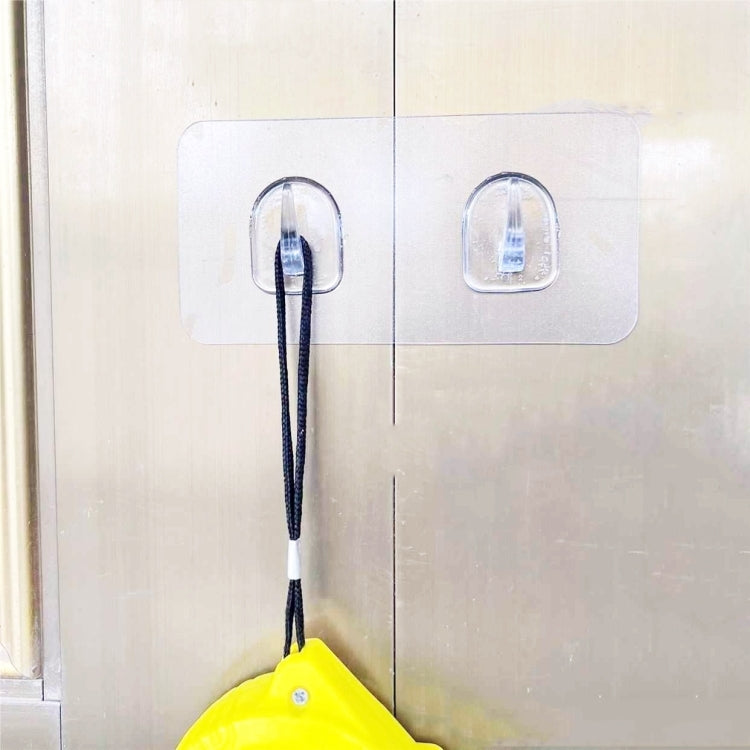 Traceless double adhesive hook with two clear plastic hooks on white backing card