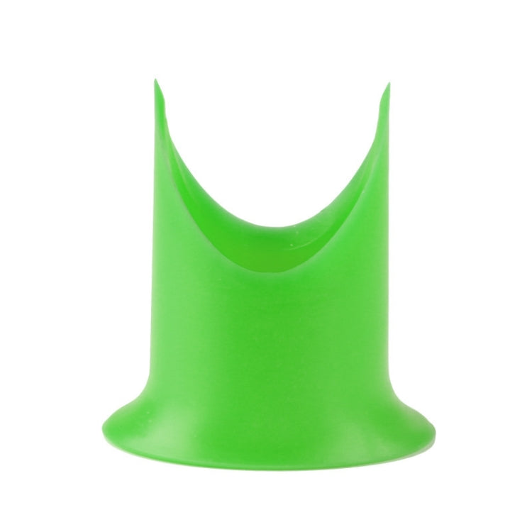 Green kitchen corer insert for removing chili seeds and cores from fruit and vegetables.