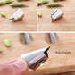 Stainless steel conical hand guard on wooden board near split pea pieces