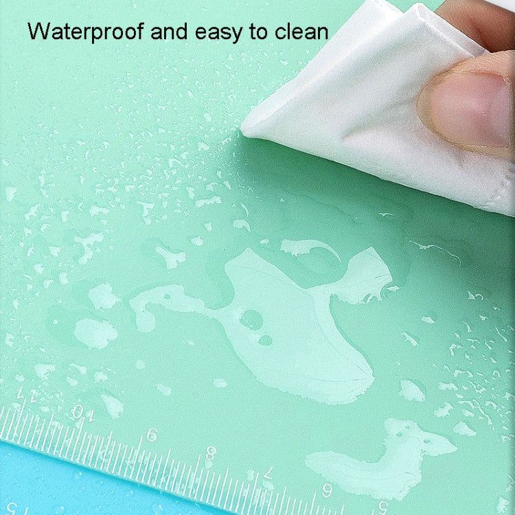 Water-resistant drawing mat with ruler edge markings for easy cleaning