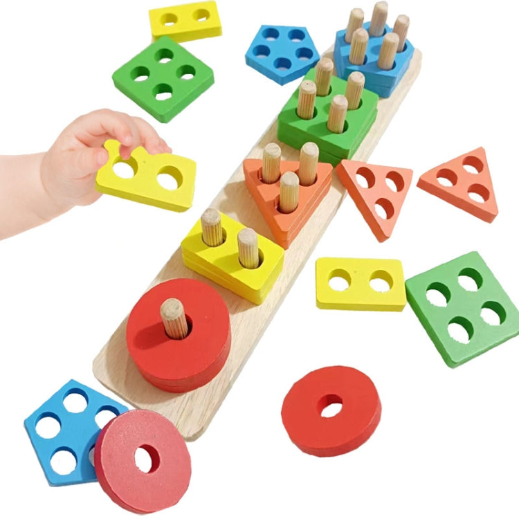 Children's wooden shape sorter blocks with colored base pieces, peg pillars, and rings