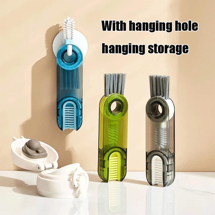 Cup lid cleaning brushes with bristles and hanging holes in blue, green, and gray