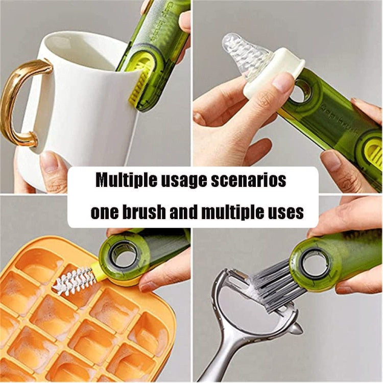 Green cup lid cleaning brush held in hand for cleaning cup rims and grooves
