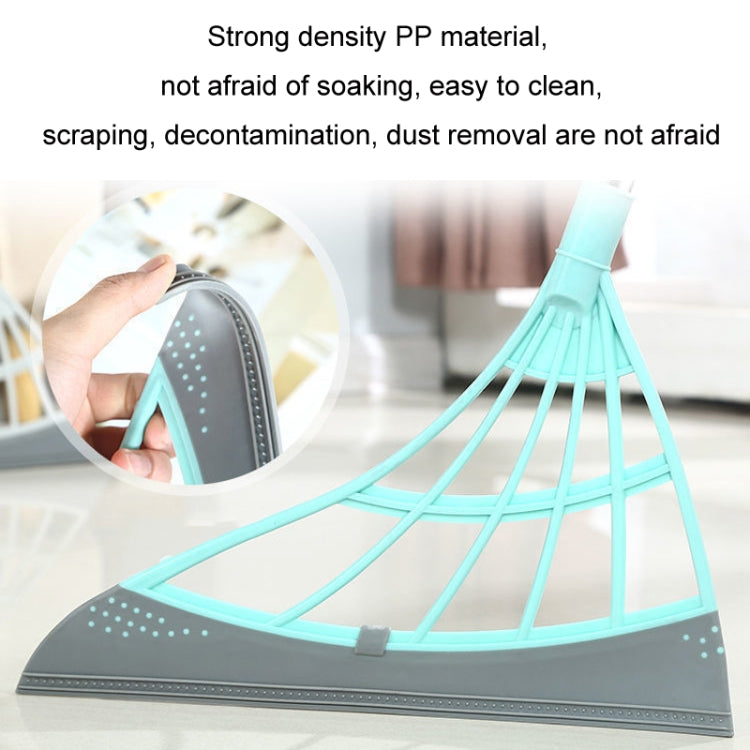 Hair cleaning broom head in teal mesh with gray scraper plate and cleaning bristles