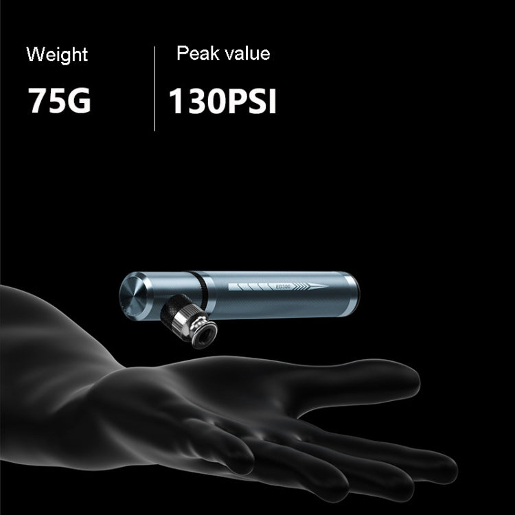 Portable mini bicycle pump held in a hand, slim aluminum barrel