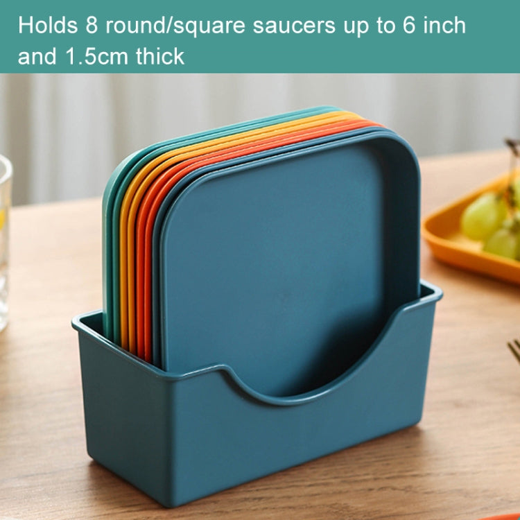 Plastic plate organizer base, blue, holding stacked plates and saucers