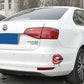 Red lip sticker with gold bullet on car rear bumper