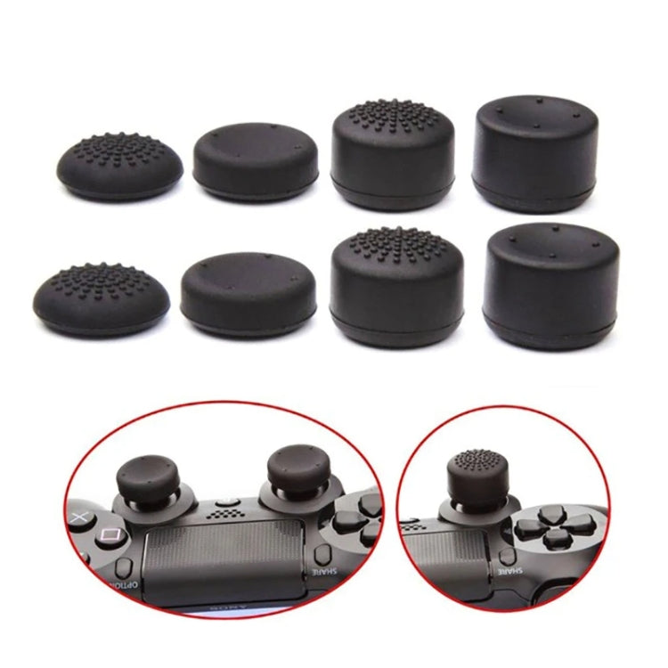 Black silicone joystick caps with textured domes; set shown on a gamepad joystick