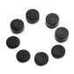 Assorted black silicone joystick caps with dotted texture and flat button tops