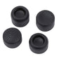 Black silicone joystick cap pair with textured grip tops and open inner rim
