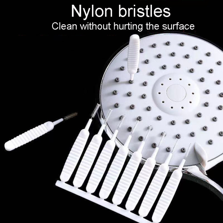 White nylon bristle showerhead cleaning brushes on a holder strip