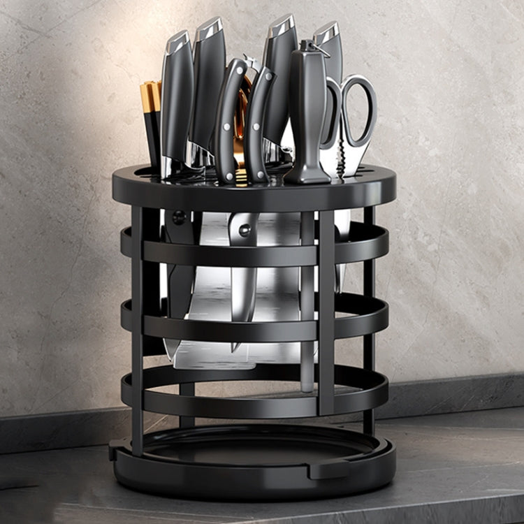 Black rotating knife and chopstick organizer cylinder with slotted storage rings and base