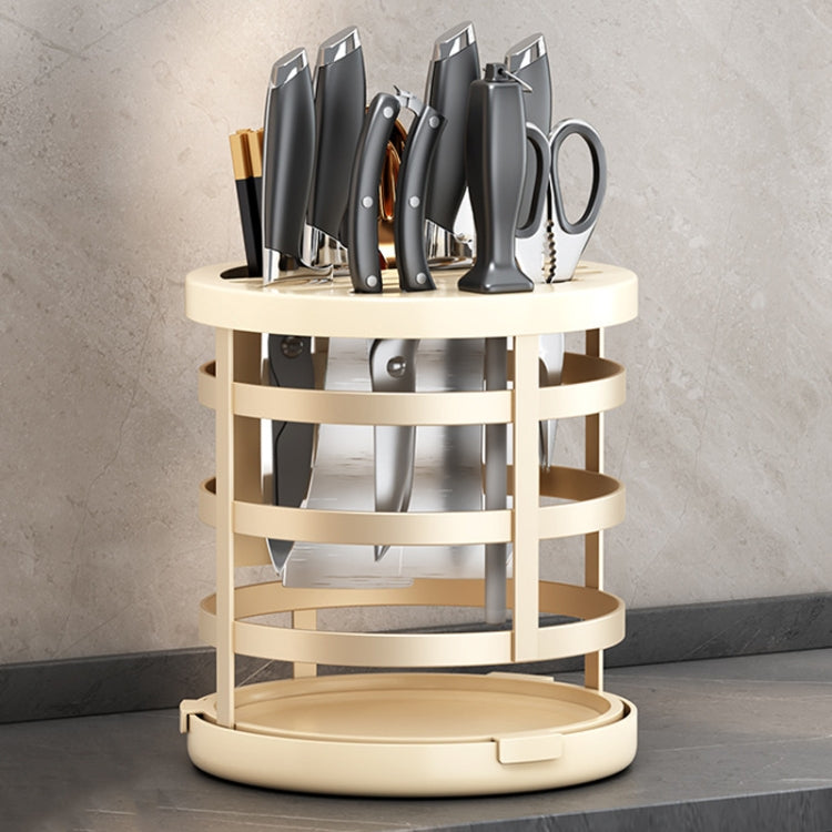 Cream rotating knife and chopstick organizer cylinder with slotted rings and circular base