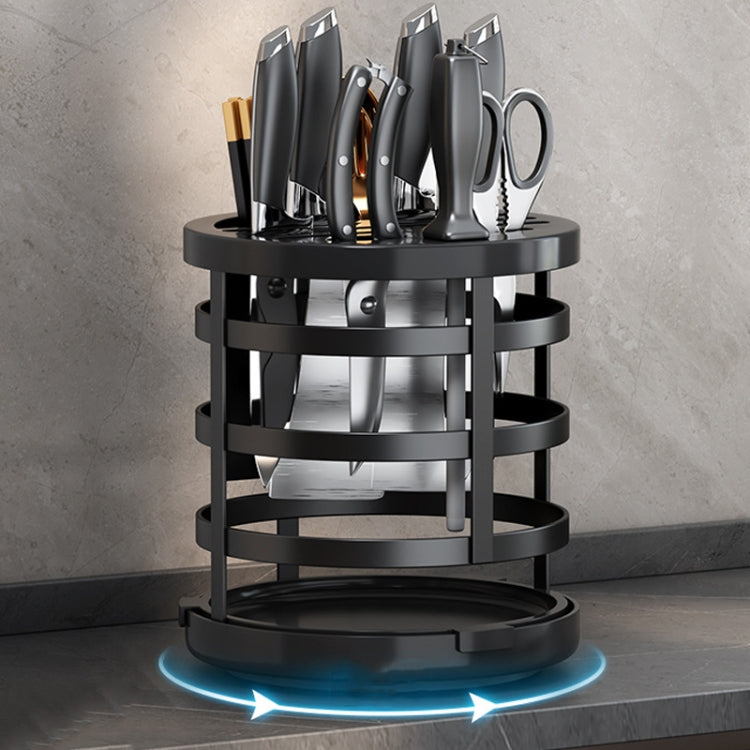 Black fixed knife and utensil organizer cylinder with open slots and circular base