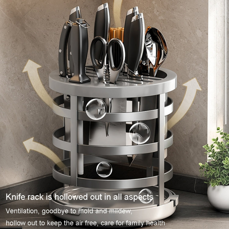 Stainless steel rotating knife rack cylinder with open storage compartments for knives