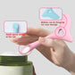 Pink silicone makeup spoon tool with heart hole and hollow hanger loop for storage