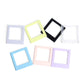 Set of square magnetic photo frame blocks in light blue, pink, black, and white