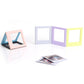 Assembled square photo frame blocks in pastel colors with a photo print