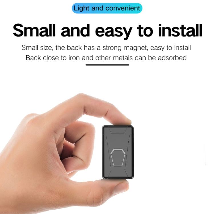 Small black GPS locator with strong magnetic back, held in a hand