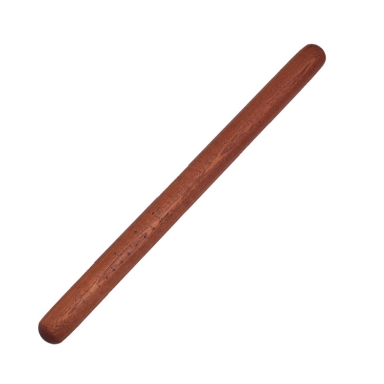 Light brown wooden rolling pin with engraved measurement markings and rounded ends