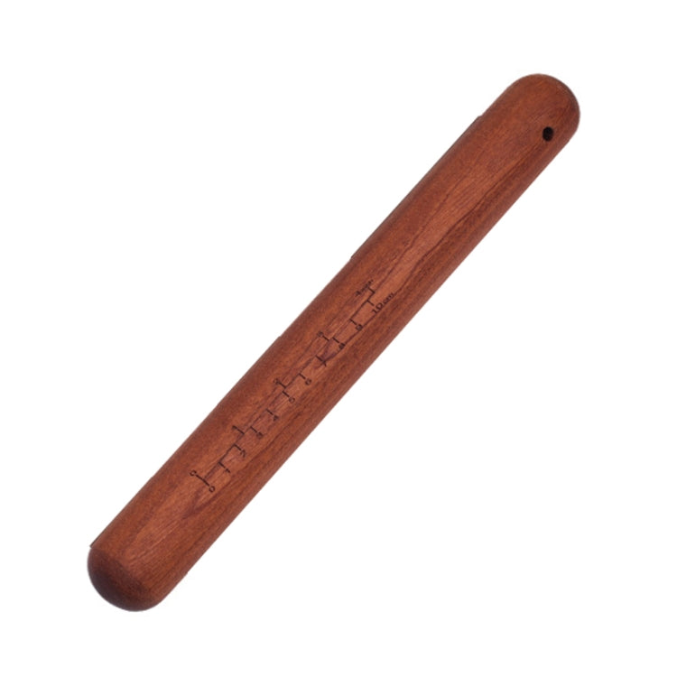 Wooden rolling pin with end hole and engraved measurement scale on the barrel