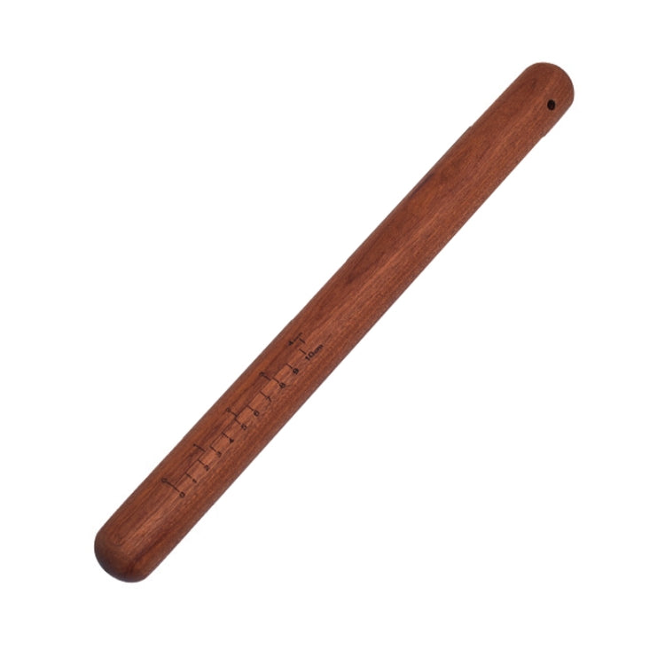 Brown wooden rolling pin with engraved measurement marks and rounded ends