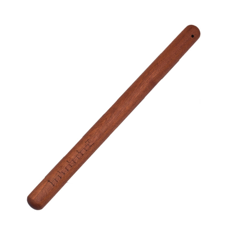 Brown wooden rolling pin with engraved measurement scale and end hanging hole