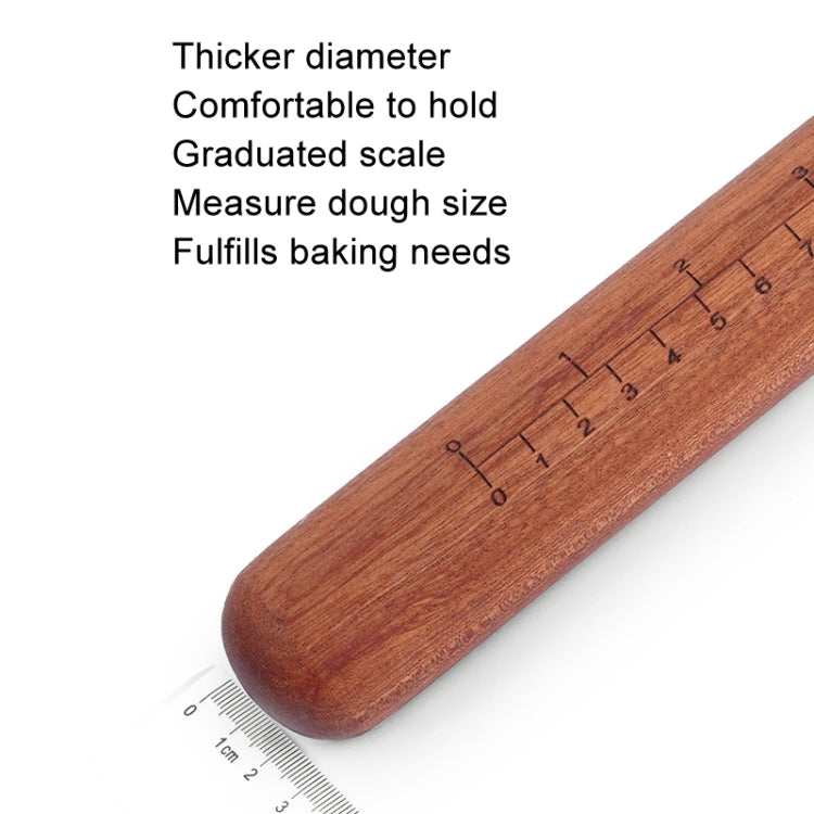 Wooden rolling pin with engraved measurement scale and rounded handle end