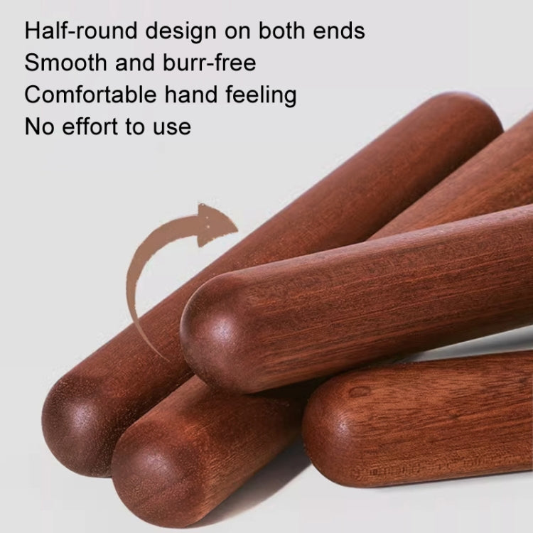 Red wooden rolling pin with rounded ends, smooth grain, hand-friendly grip