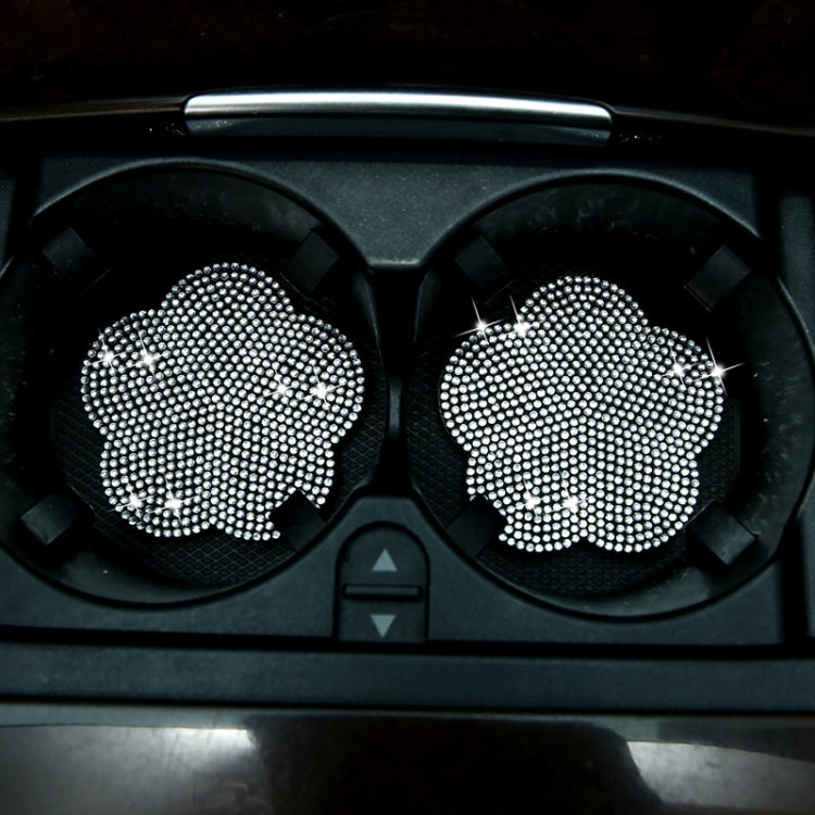Pair of car-mounted rhinestone plum blossom water coasters with white sparkle dot design