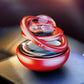 Car aromatherapy rotating solar ornament with clear globe, red base, and chrome ring