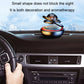 Car aromatherapy rotating solar ornament on dashboard air vent area