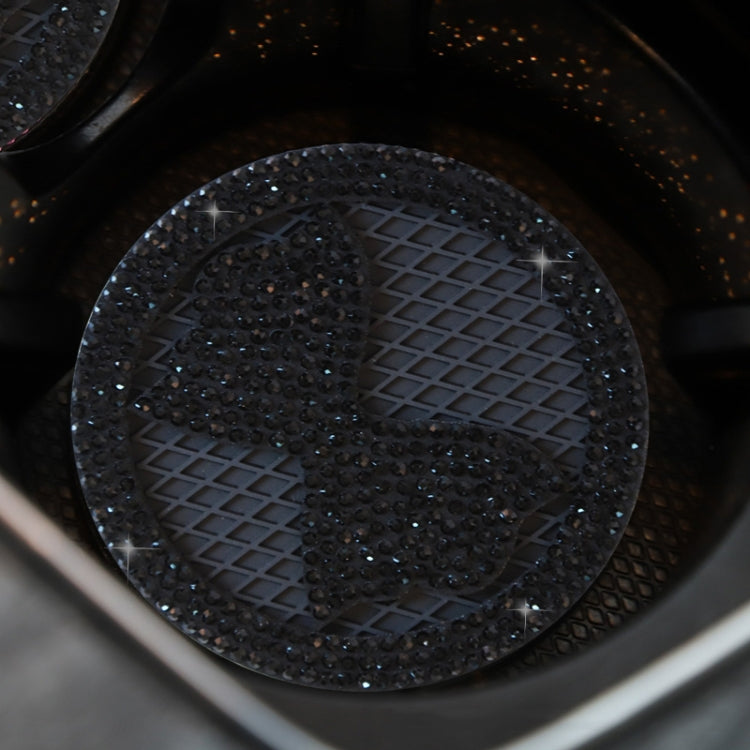 Car anti-slip coaster with diamond-bow crystal, dark rhinestones on black textured mat
