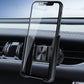 Black car air vent phone holder with snap-on base holding a smartphone